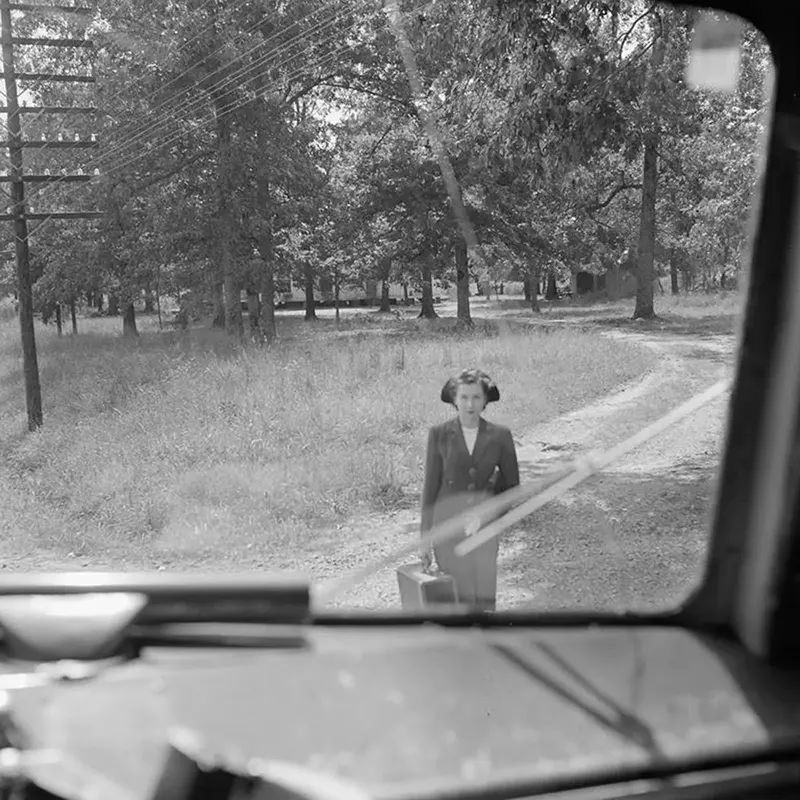 A woman waits for a pickup between Louisville and Memphis.