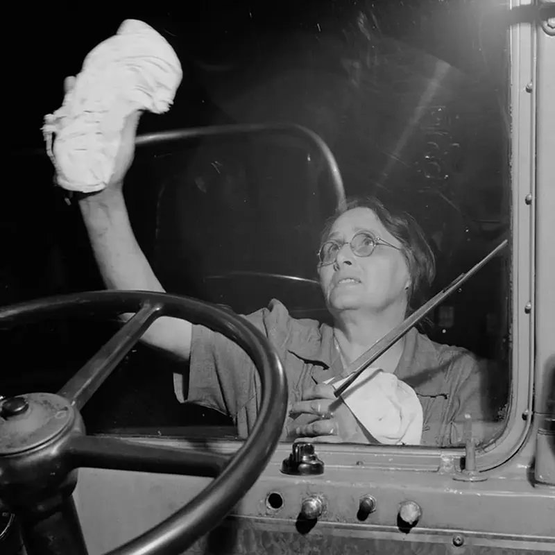 A worker cleans the windshield of a bus at the Greyhound garage in Pittsburgh.