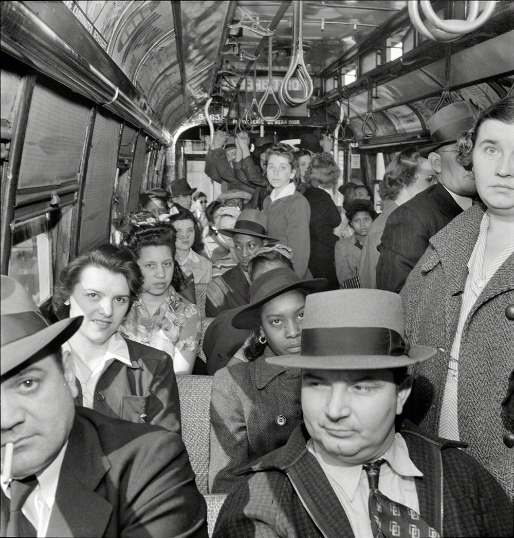 Students and workers returning home on a trolley, Baltimore, April 1943