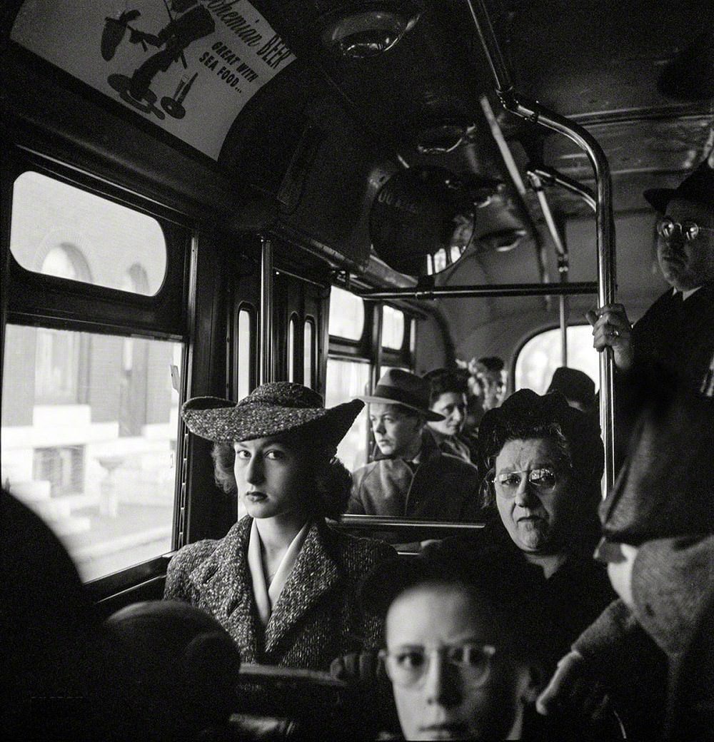 Baltimore, Maryland. Crowded bus carrying people to work, Baltimore, April 1943