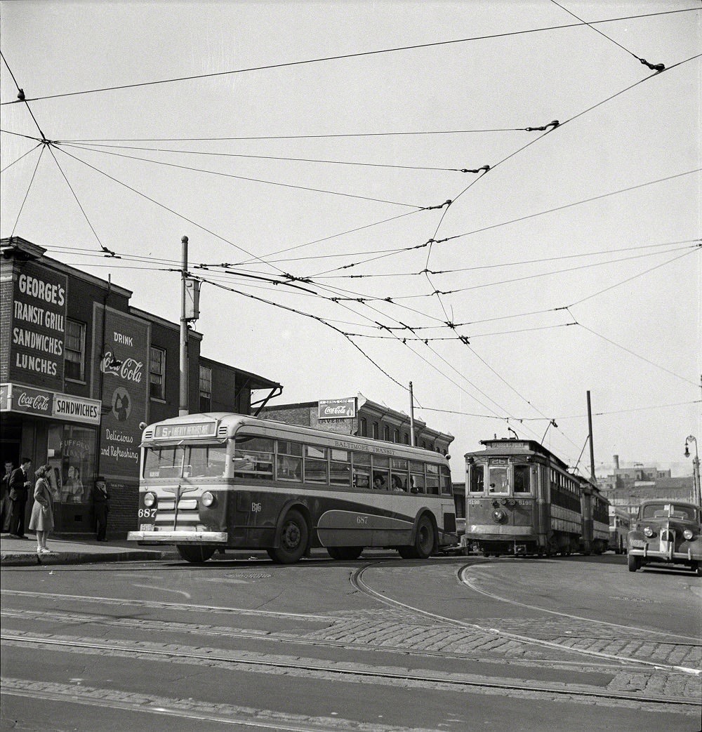 Baltimore Transit bus with trolleys of 1917, Baltimore, Maryland, April 1943