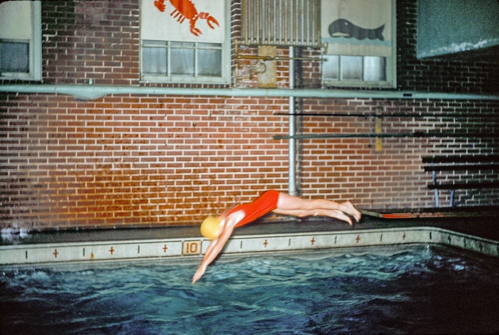 A women diving in swimming pool, Baltimore, 1961