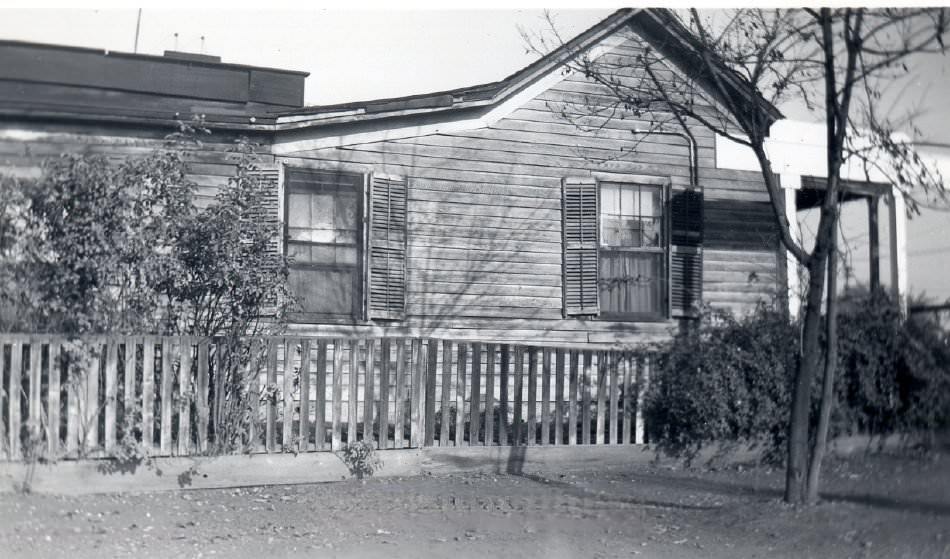 Side view of wooden house, 1940