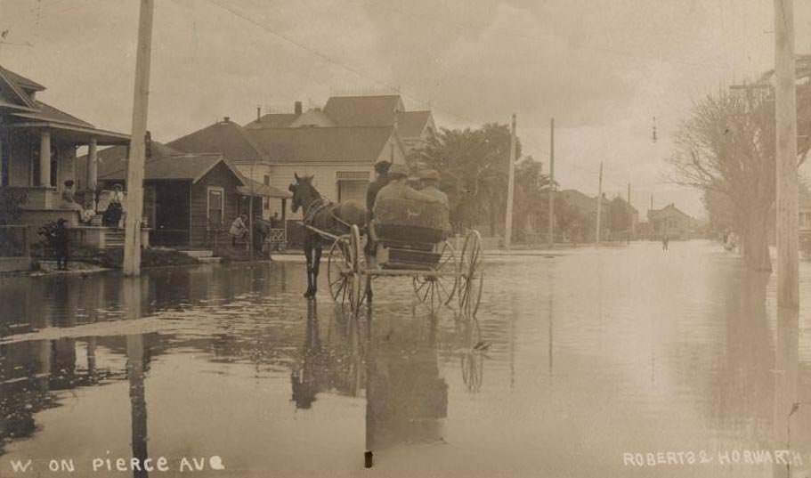 Horse-drawn carriage on flooded Pierce Avenue, 1911