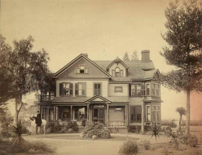 Victorian gothic farmhouse, with woman on horseback, 1880