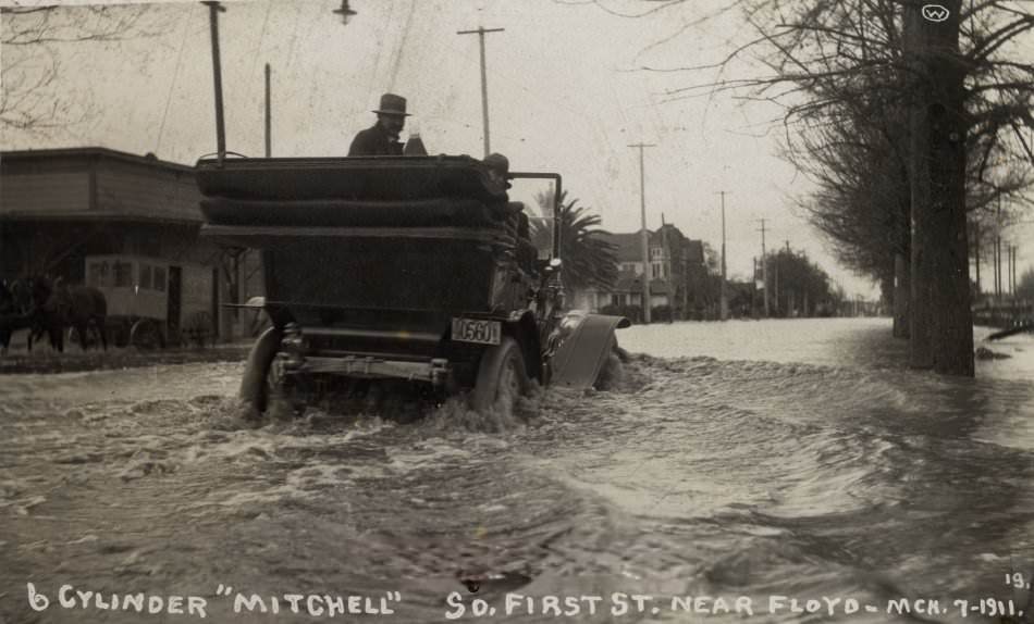 Mitchell automobile on flooded street, 1911