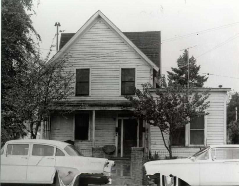 Split level home with cars in front, 1940