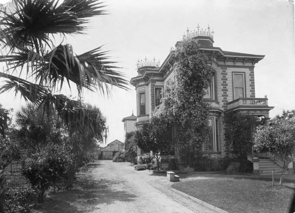 Victorian house with barn, 1900