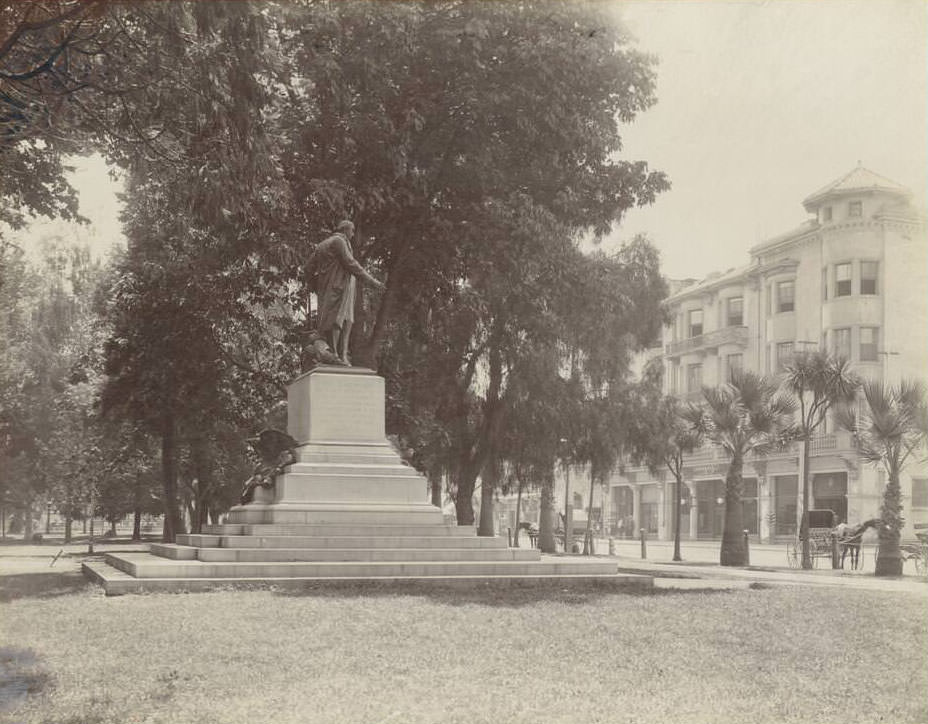 Exterior view of Saint James Hotel and park in San Jose, 1900