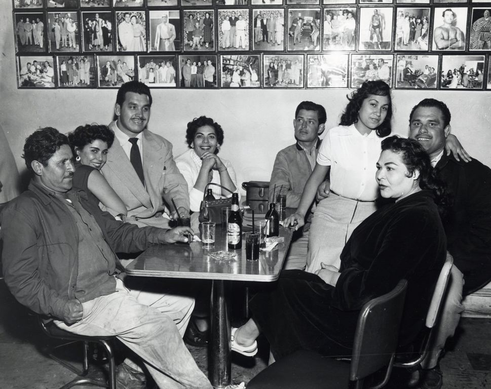 The Torres brothers with friends at the Ringside, 1953