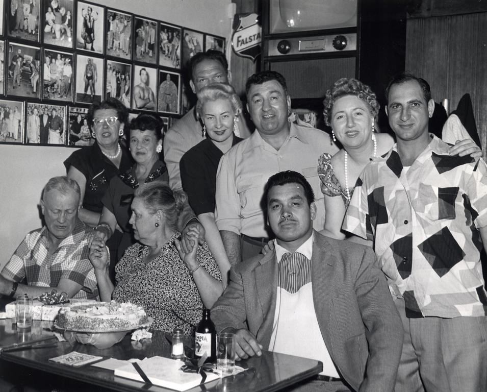 Shirlie Montgomery, Enrique Torres and Angelo Cistoldi at the Ringside Bar, 1950s
