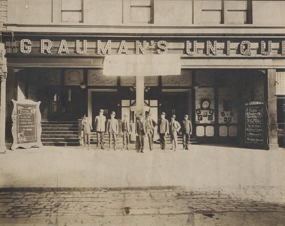 Men in front of Grauman's Unique Theatre, 1904