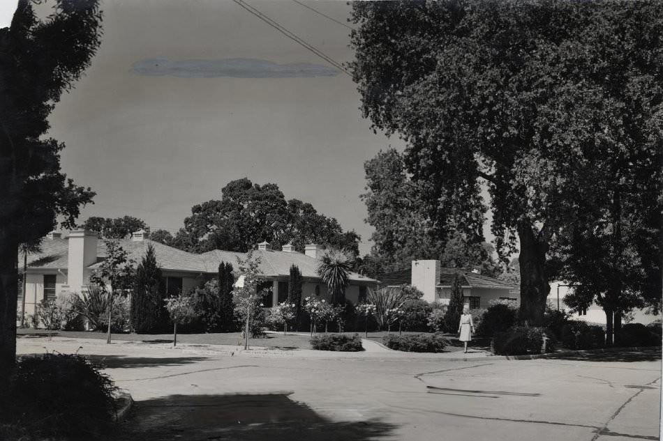 Residence, woman walking on sidewalk, San Jose, 1947