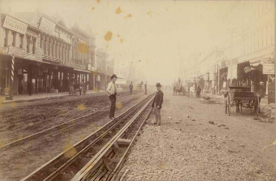 Laying track for electric street car system, San Jose, 1887