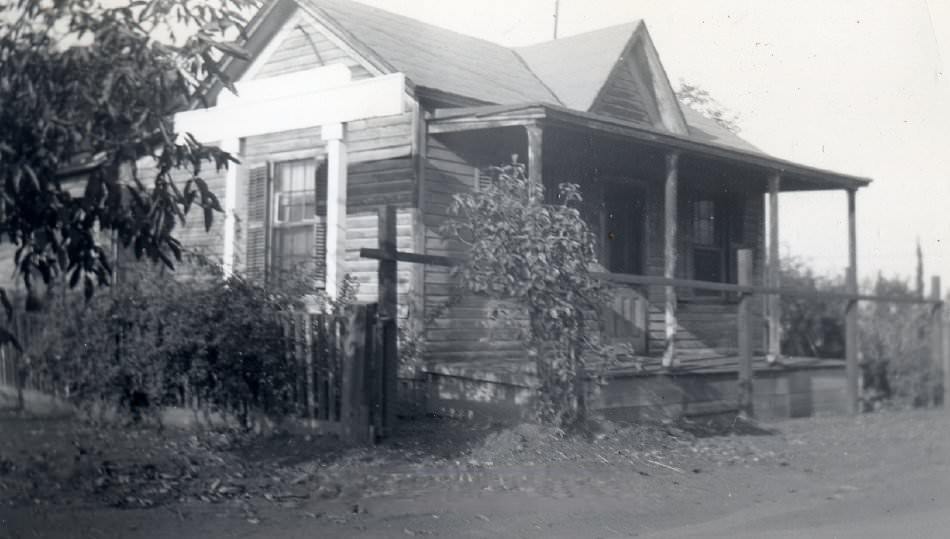 Back view of wooden house, 1940
