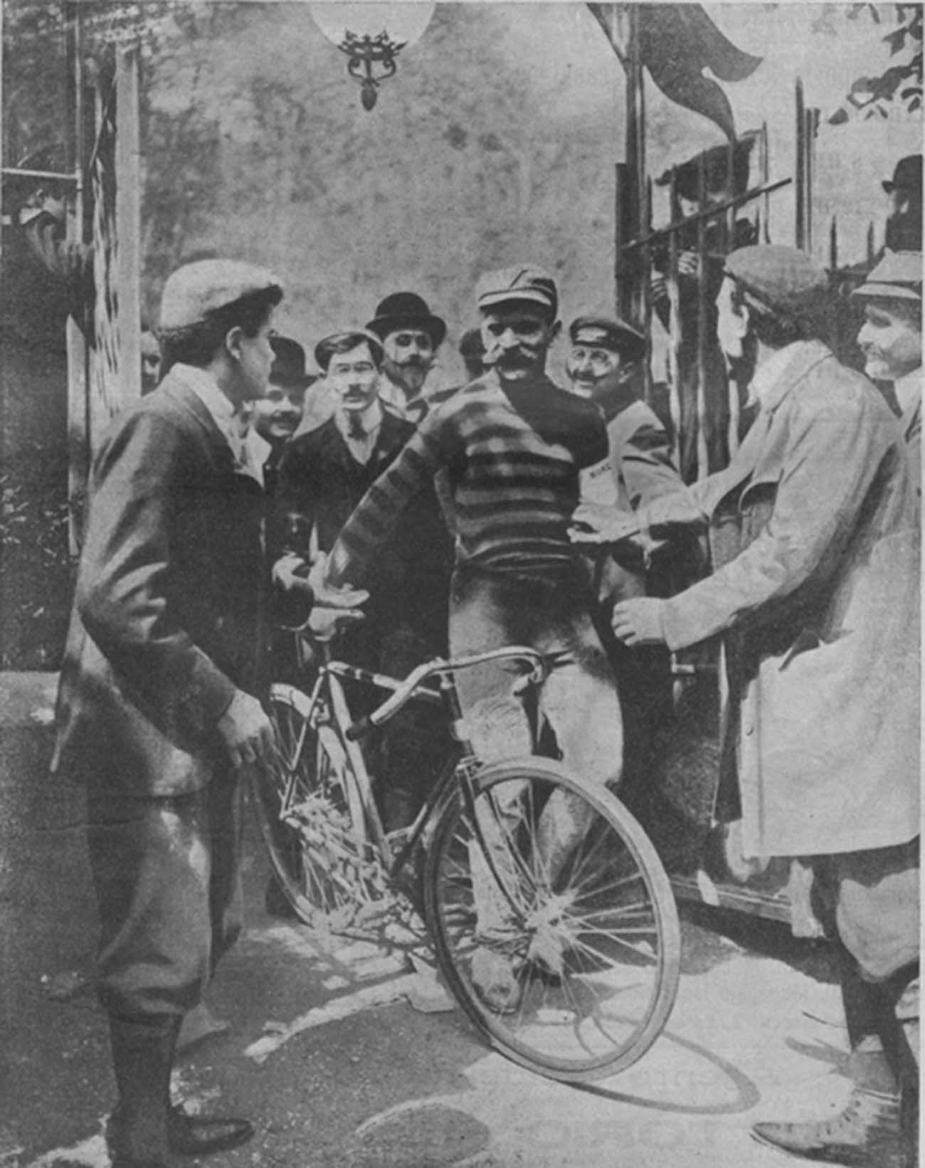 Maurice Garin is greeted by enthusiastic fans.