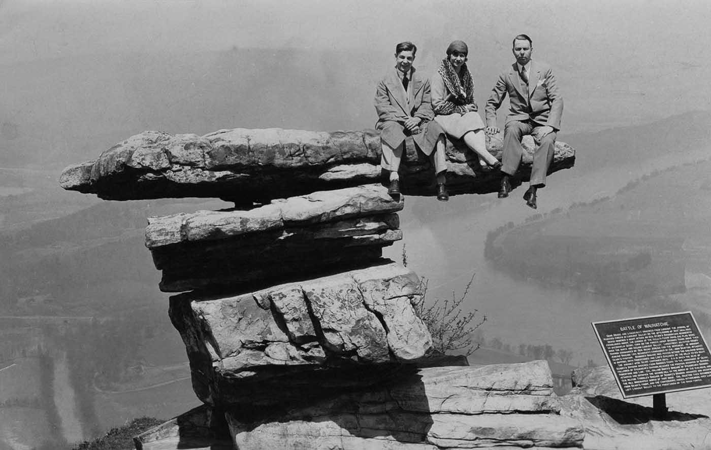 People posing on Tennessee's Umbrella Rock in Lookout Mountain, 1860-1940