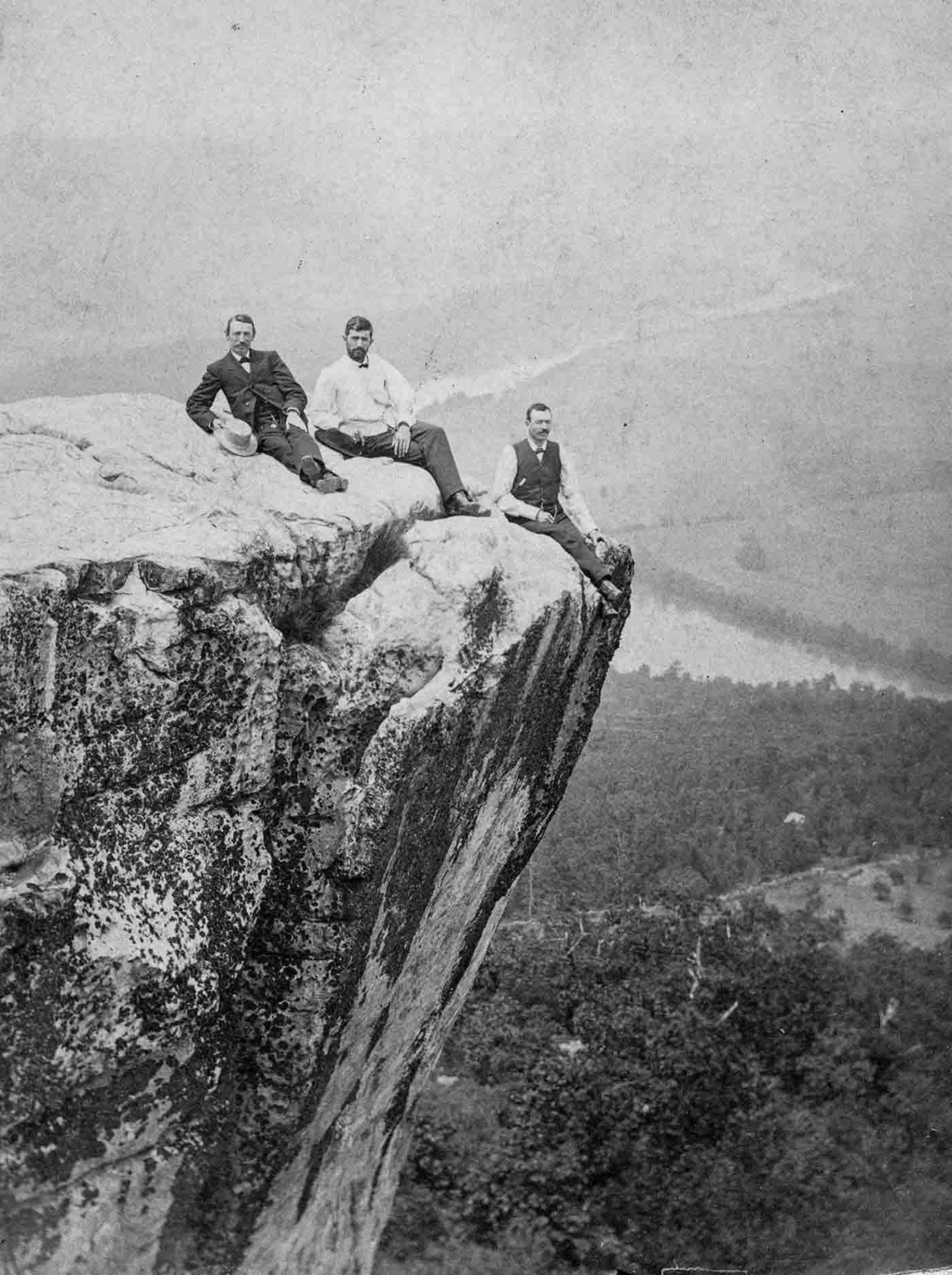 People posing on Tennessee's Umbrella Rock in Lookout Mountain, 1860-1940