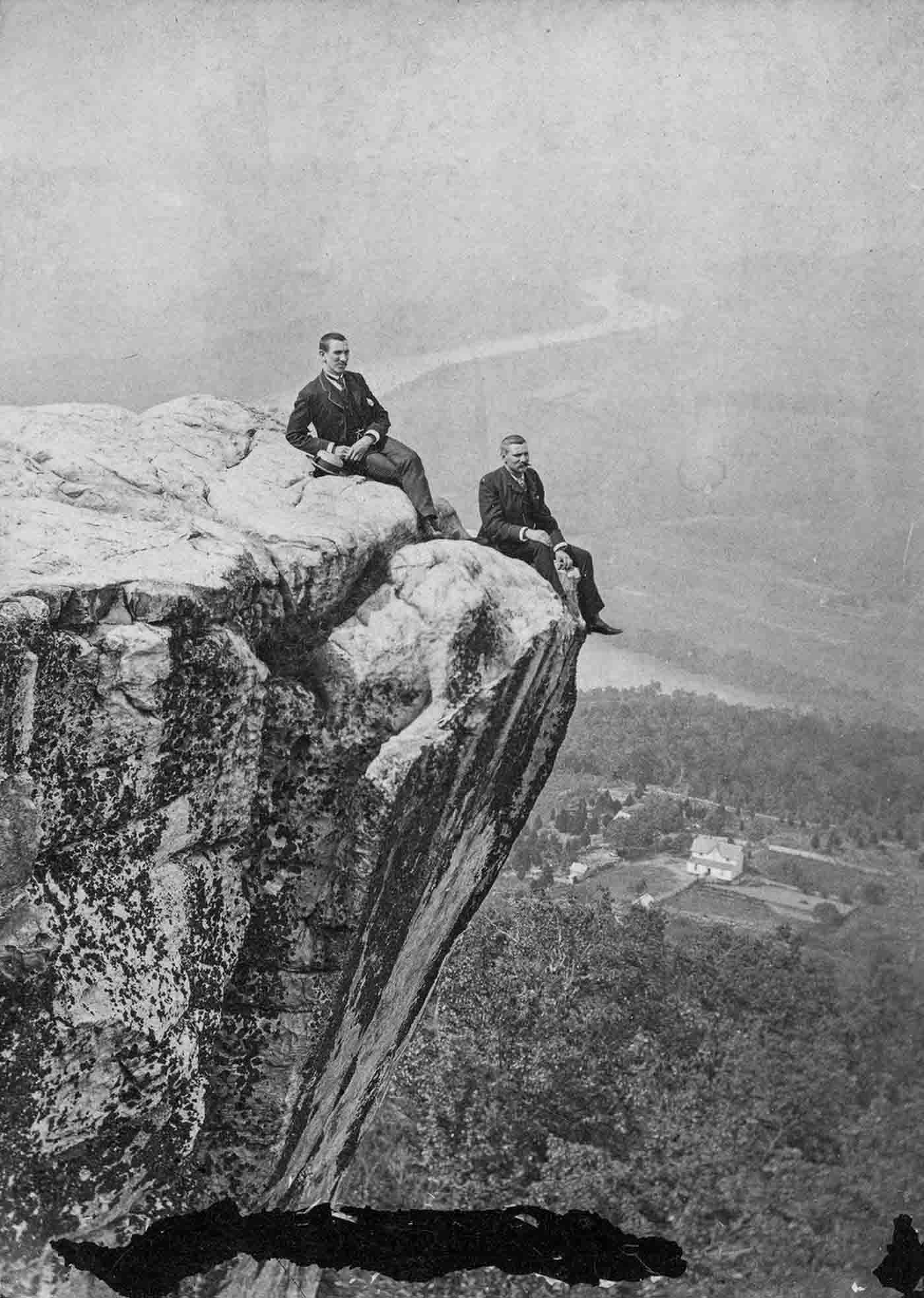 People posing on Tennessee's Umbrella Rock in Lookout Mountain, 1860-1940