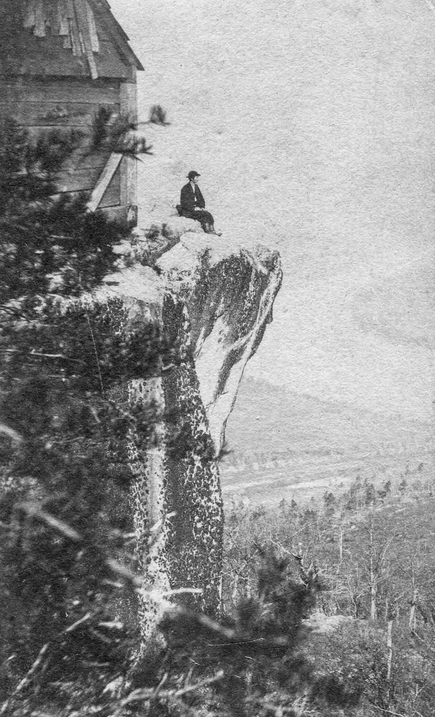 People posing on Tennessee's Umbrella Rock in Lookout Mountain, 1860-1940