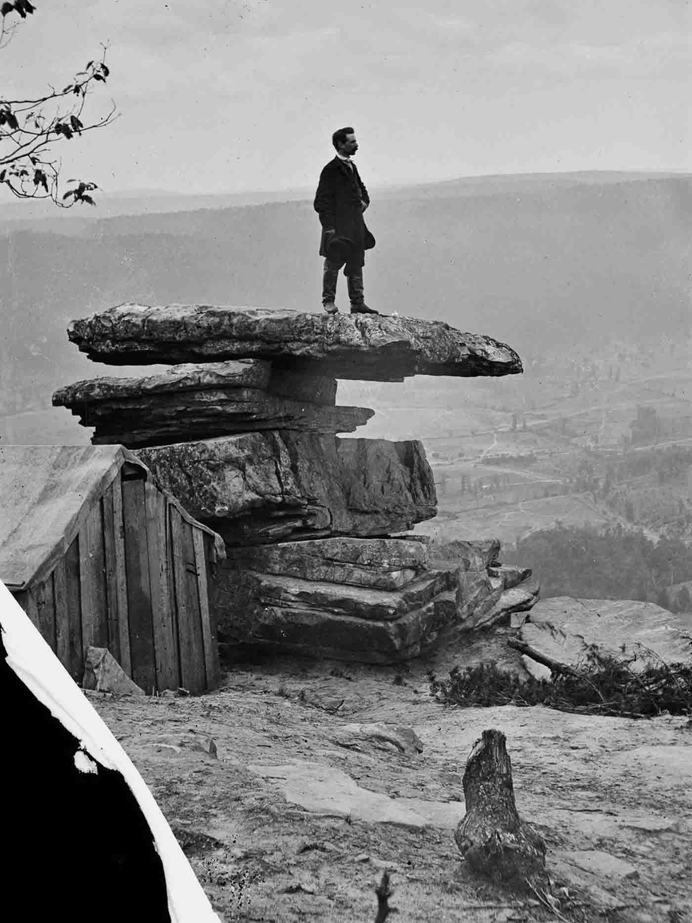 People posing on Tennessee's Umbrella Rock in Lookout Mountain, 1860-1940