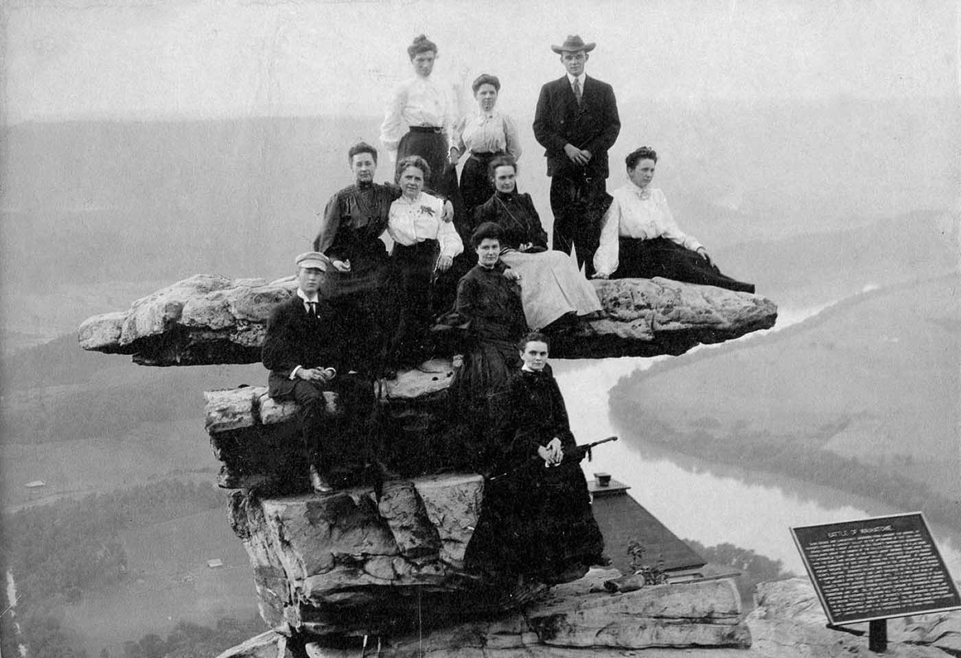 People posing on Tennessee's Umbrella Rock in Lookout Mountain, 1860-1940