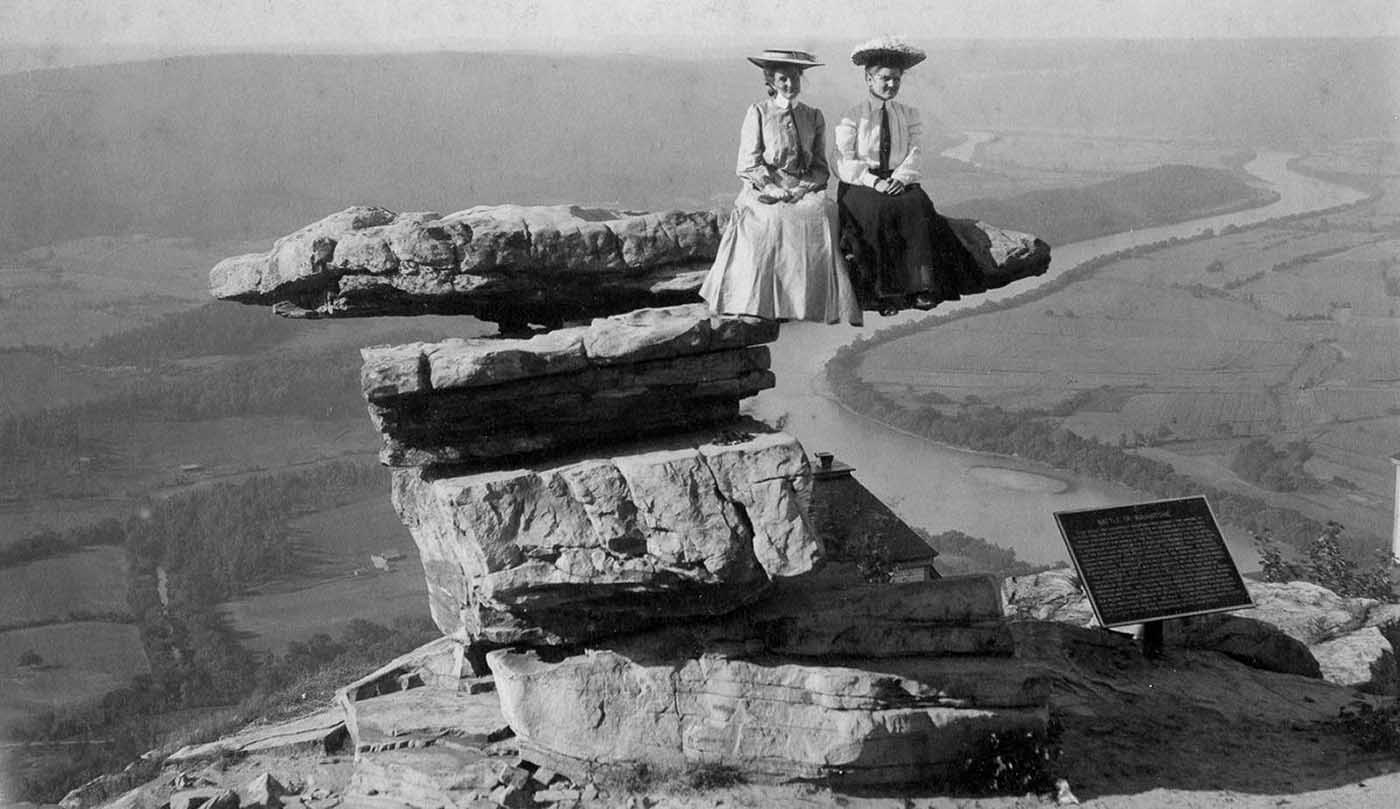 People posing on Tennessee's Umbrella Rock in Lookout Mountain, 1860-1940