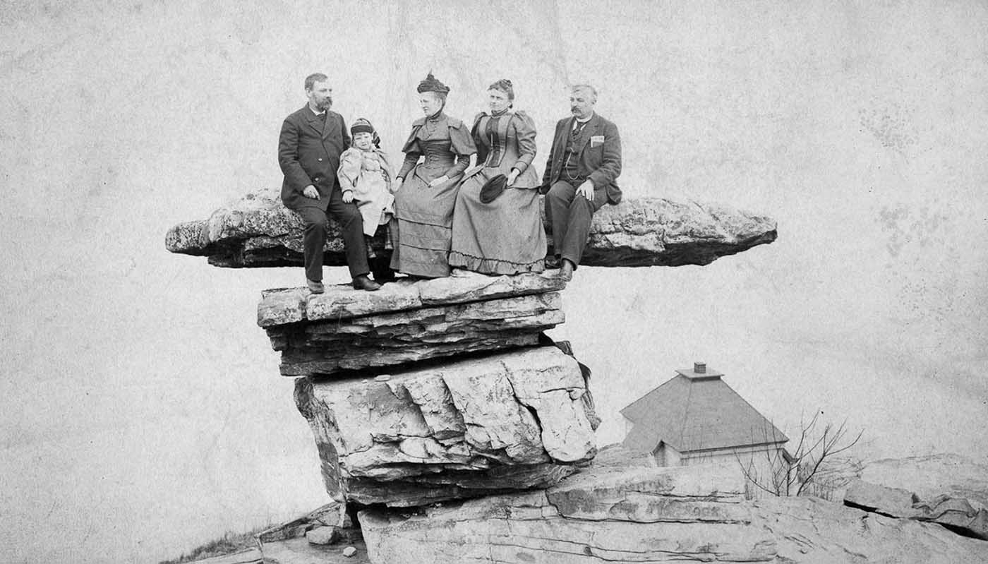 People posing on Tennessee's Umbrella Rock in Lookout Mountain, 1860-1940