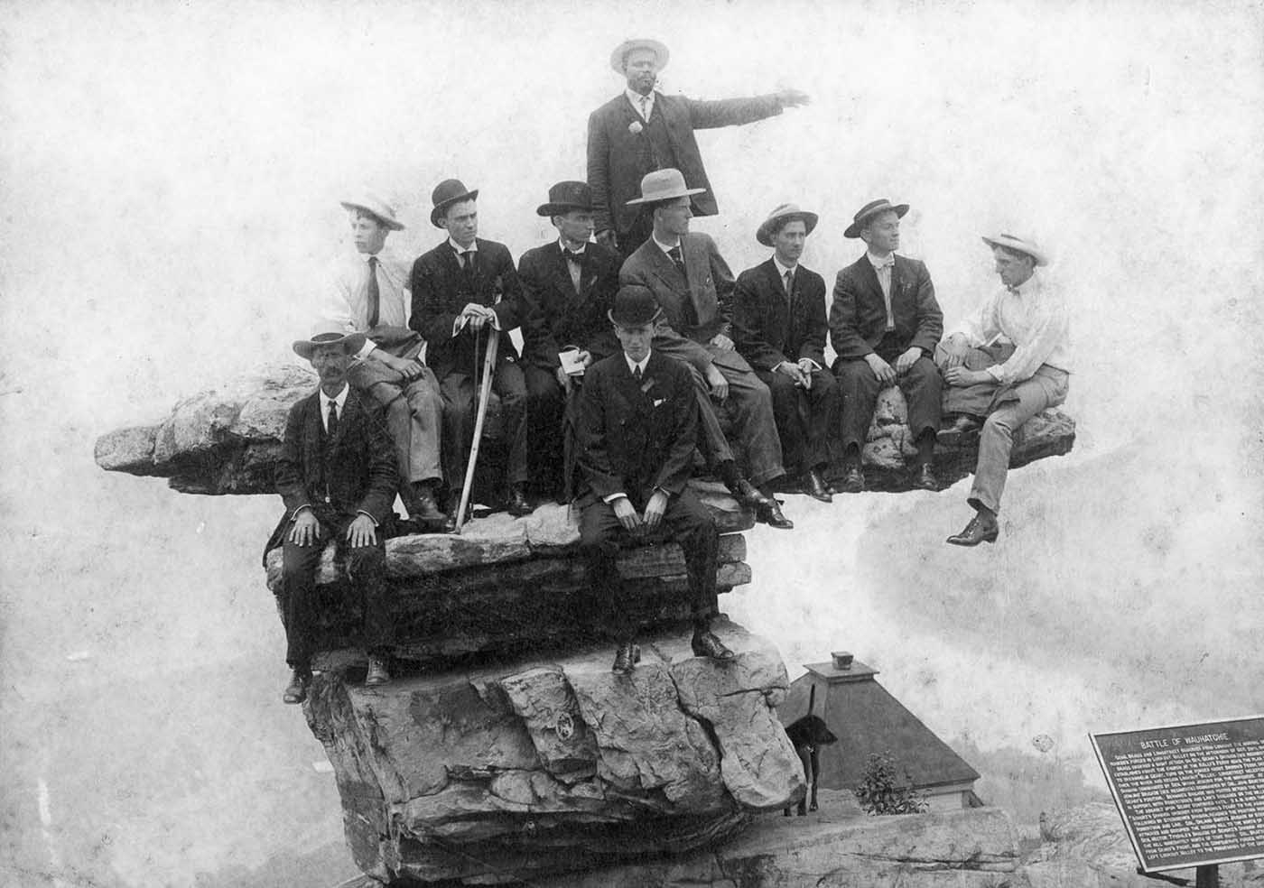 People posing on Tennessee's Umbrella Rock in Lookout Mountain, 1860-1940