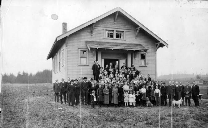 People pose for a photo at the Lake Shore Grange in Vancouver, 1920