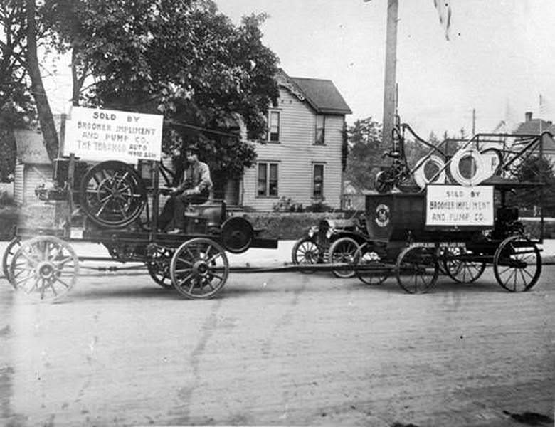 A Brooker Implement and Pump Company float moves down the road during an unidentified parade in Vancouver, 1890