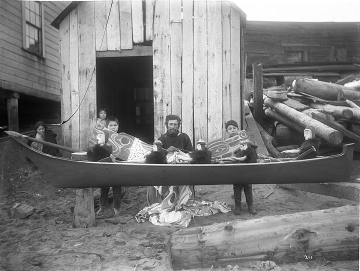 Young Doctor and his canoe [for Captain Tozier] [Barclay Sound, Vancouver, 1903