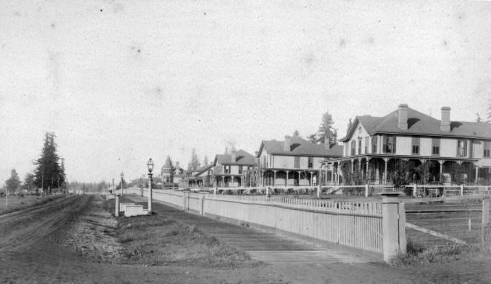 A view of Officer's Row at the Vancouver Barracks looking west with the houses on the right, 1909