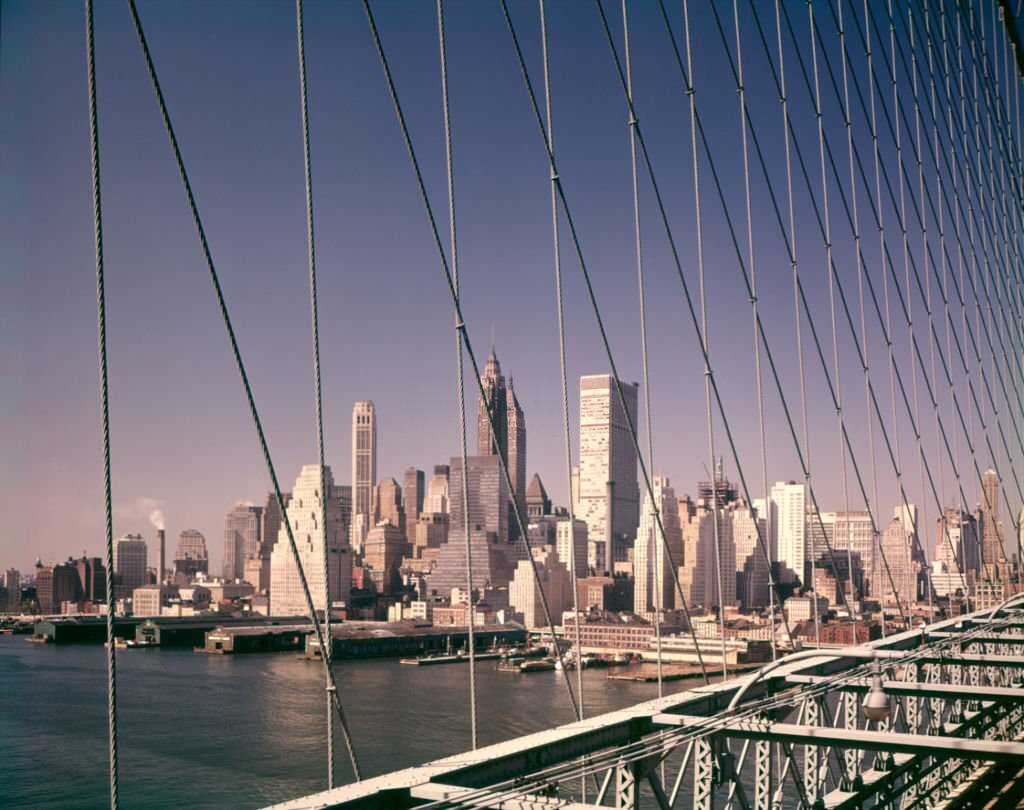 Downtown Manhattan Financial Area Skyline seen through Brooklyn Bridge.