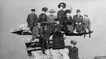 People posing on Tennessee's Umbrella Rock in Lookout Mountain, 1860-1940