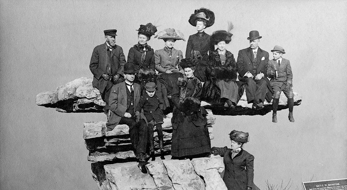People posing on Tennessee's Umbrella Rock in Lookout Mountain, 1860-1940