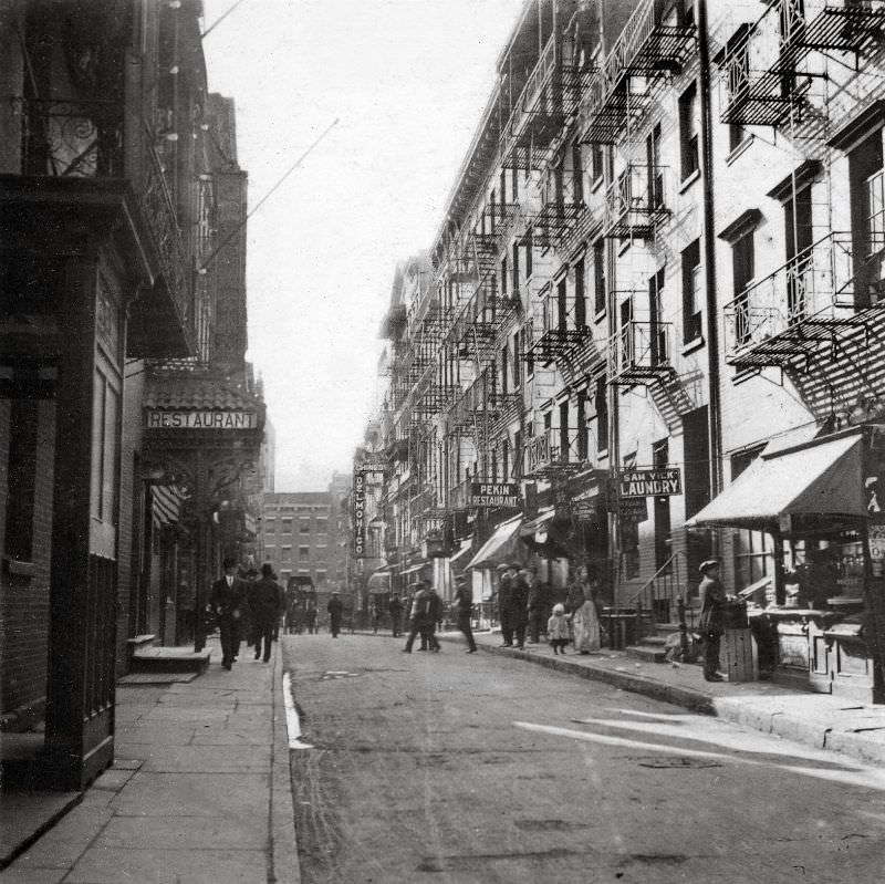 Pell Street in Chinatown. The Chinese Delmonico is visible back right, New York, 1914