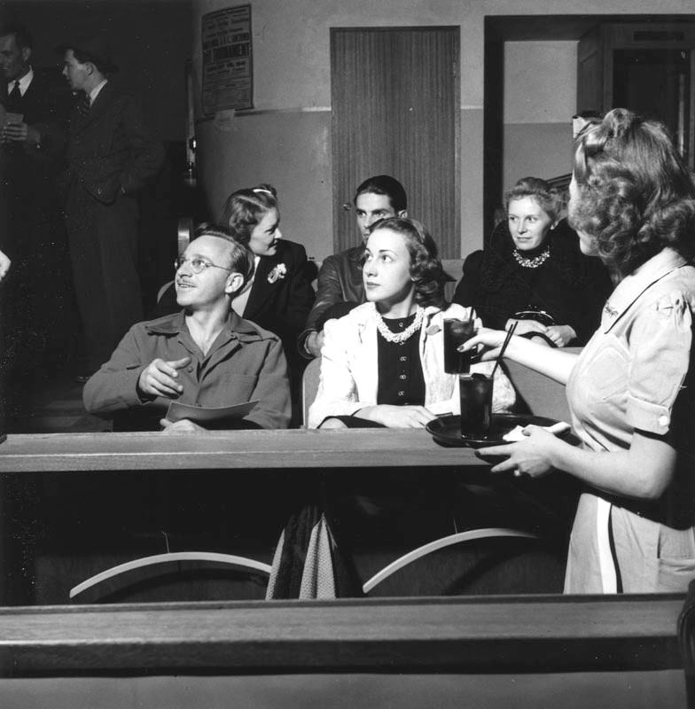 Spectators watched the bowling tournament.