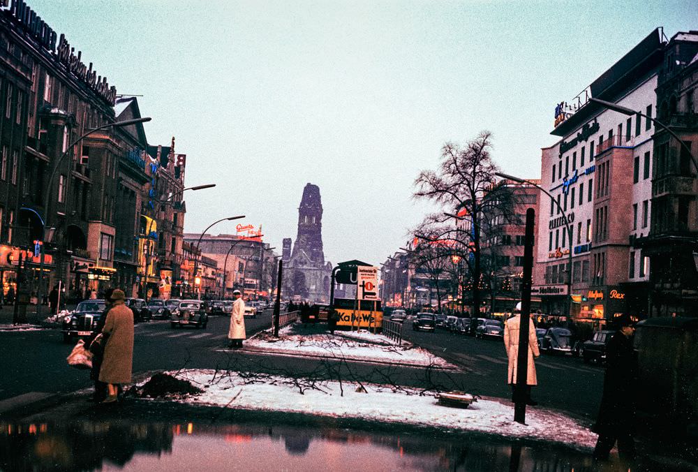 Shot from inside a car, this photograph shows the Kurfürstendamm - one of West Berlin's busiest commercial streets in 1956 (and today).