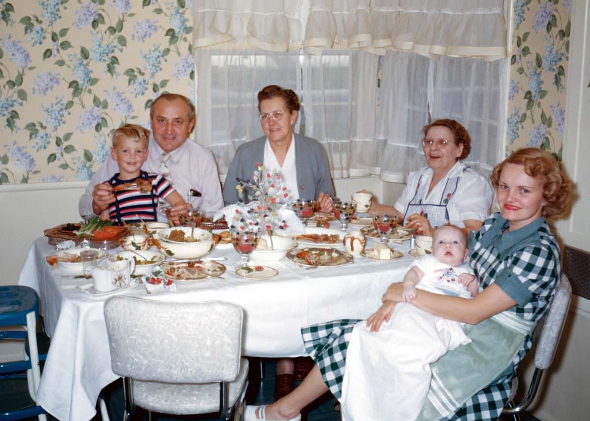 Our family Thanksgiving in 1951 with my three grandparents and my brother while Dad takes the photo.