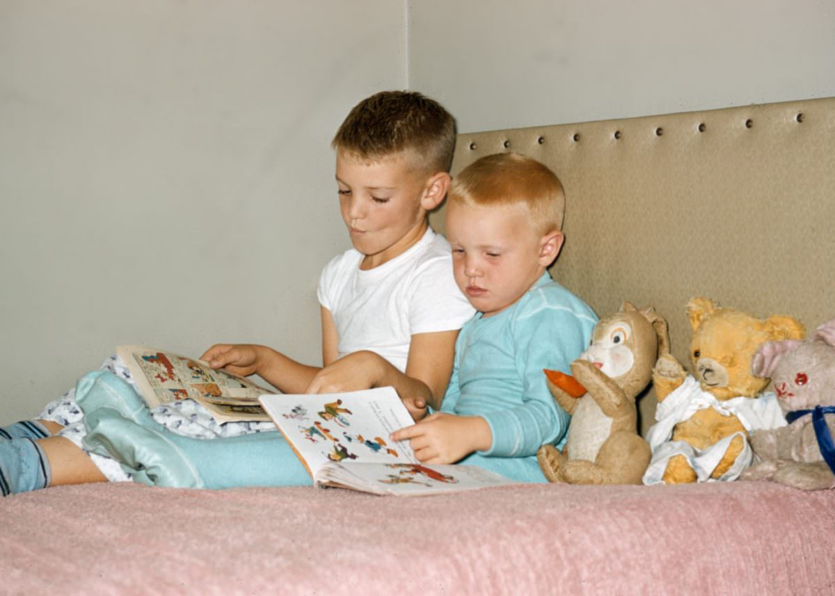 Me and my older brother reading Donald Duck books with our stuffed animals, 1954