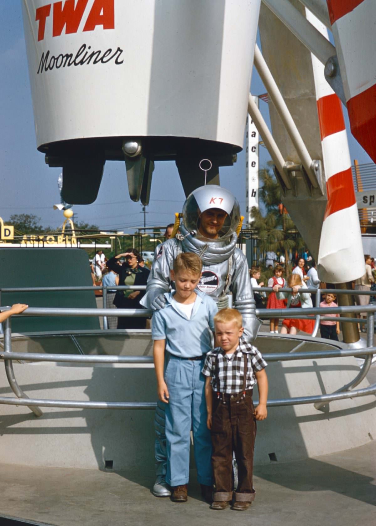 John, 4, and his older brother in Tomorrowland, 1955