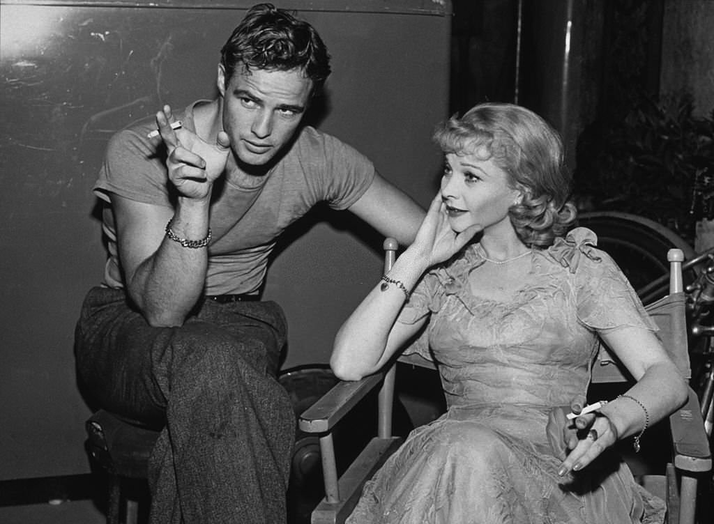 Marlon Brando and Vivien Leigh relax on the set of 'A Streetcar Named Desire', 1951.