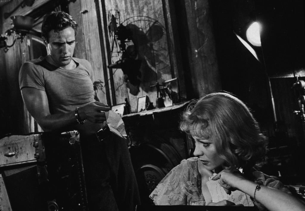Actor Marlon Brando hands a tissue to Vivien Leigh in a still from the film, 'A Streetcar Named Desire', 1951.