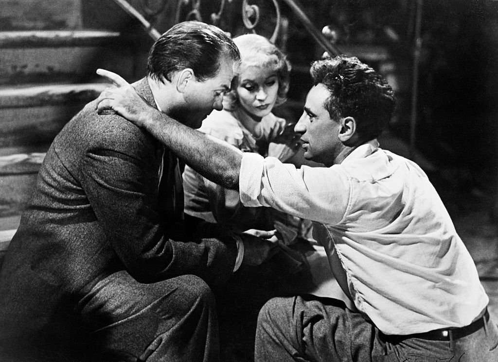 Director Elia Kazan (right) gives instructions to actors Karl Malden and Vivien Leigh before shooting a scene from the movie A Streetcar Named Desire