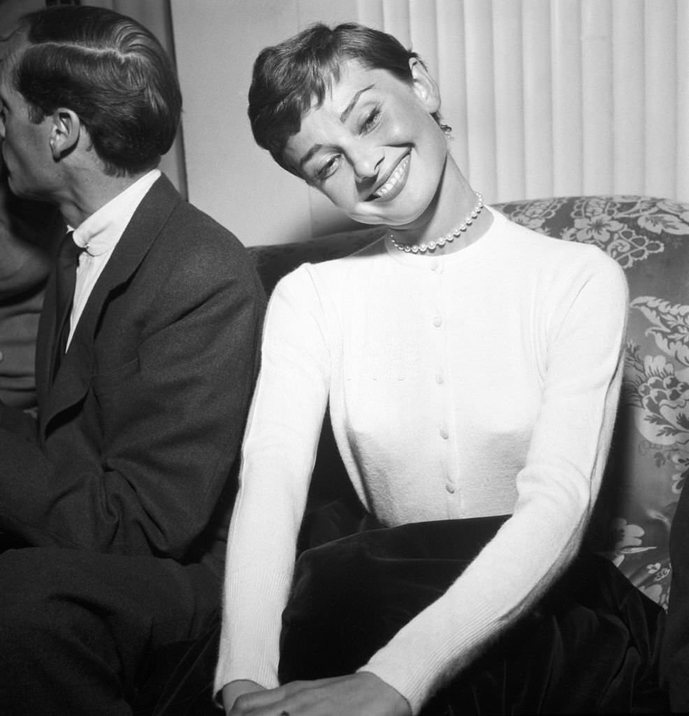 Audrey Hepburn attending to a press conference for the movie War and Peace.