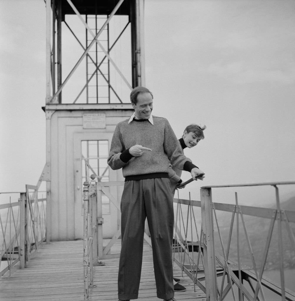 Audrey Hepburn with her husband Mel Ferrer at the top of the Hammetschwand Lift at the summit of the Bürgenstock, 1955