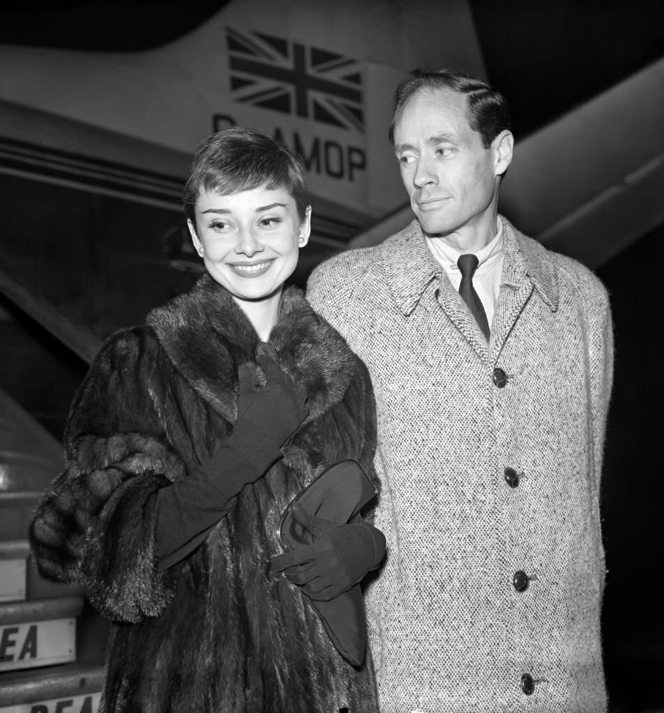 Film stars Mel Ferrer and his wife Audrey Hepburn arrived at London Airport by BEA plane from Rome, 1954