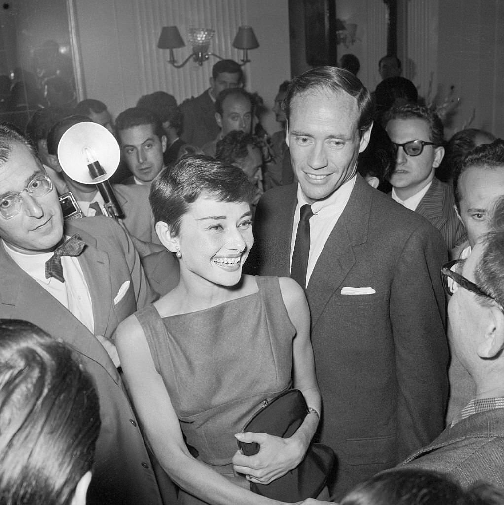 Audrey Hepburn and Mel Ferrer Speaking to Journalists