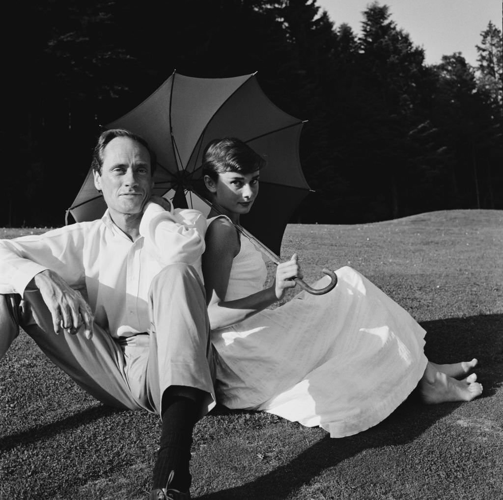 Audrey Hepburn and Mel Ferrer on a golf course at the Bürgenstock resort, Switzerland, 1954.